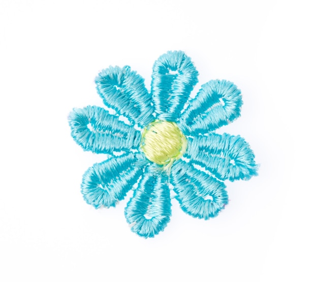 Szczegół haftowanego kwiatu